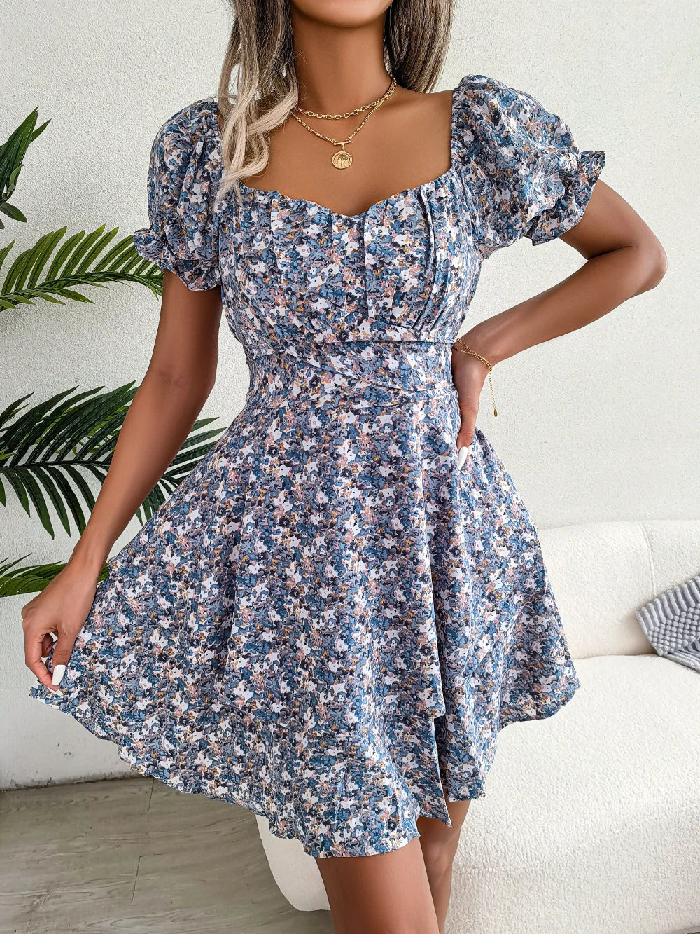 Elegant floral mini dress with A-line silhouette and short sleeves in a variety of vibrant colors