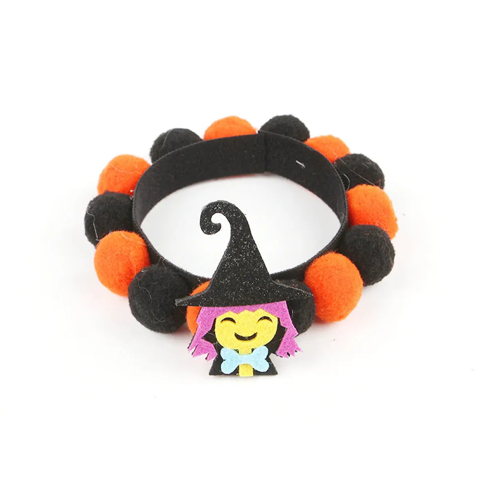 Halloween fur ball pet collar with pumpkin, pirate, witch and skull designs in six colour options