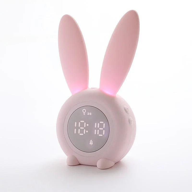 Adorable bunny-eared LED alarm clock with sound control, available in blue, green, and pink colors