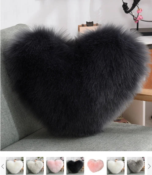 Cozy heart-shaped plush throw pillows in various colors and sizes for living room and bedroom decor