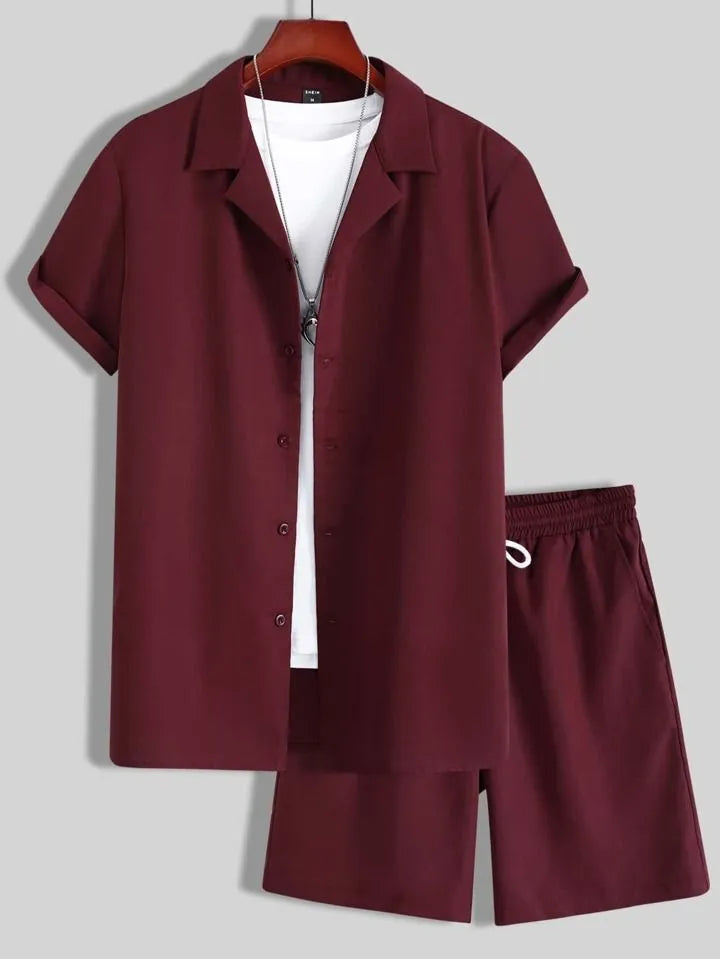 Man wearing a white short sleeve Cuban collar shirt and matching shorts from a polyester sport suit set.