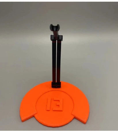 Versatile multi-jointed robotic action figure with customizable posing and design capabilities