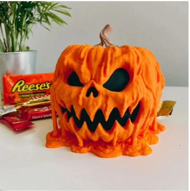 Spooky Halloween pumpkin-shaped candy bowl with lid, made of durable PVC for reusable and easy-to-clean trick-or-treating display