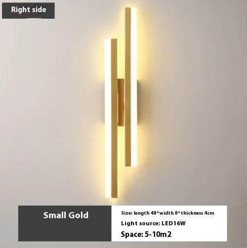 Scandinavian minimalist LED wall light with acrylic shade and adjustable arm in black or gold finish.