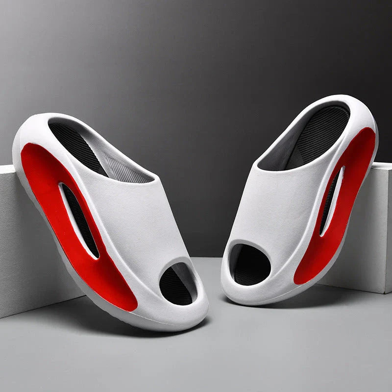 Stylish and comfortable unisex slippers with a unique hollow design, perfect for summer beach and casual wear