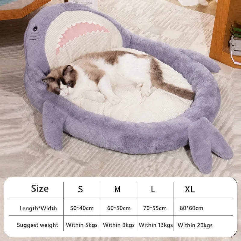 Blue shark pattern pet bed for dogs with soft velvet fabric and anti-slip base.