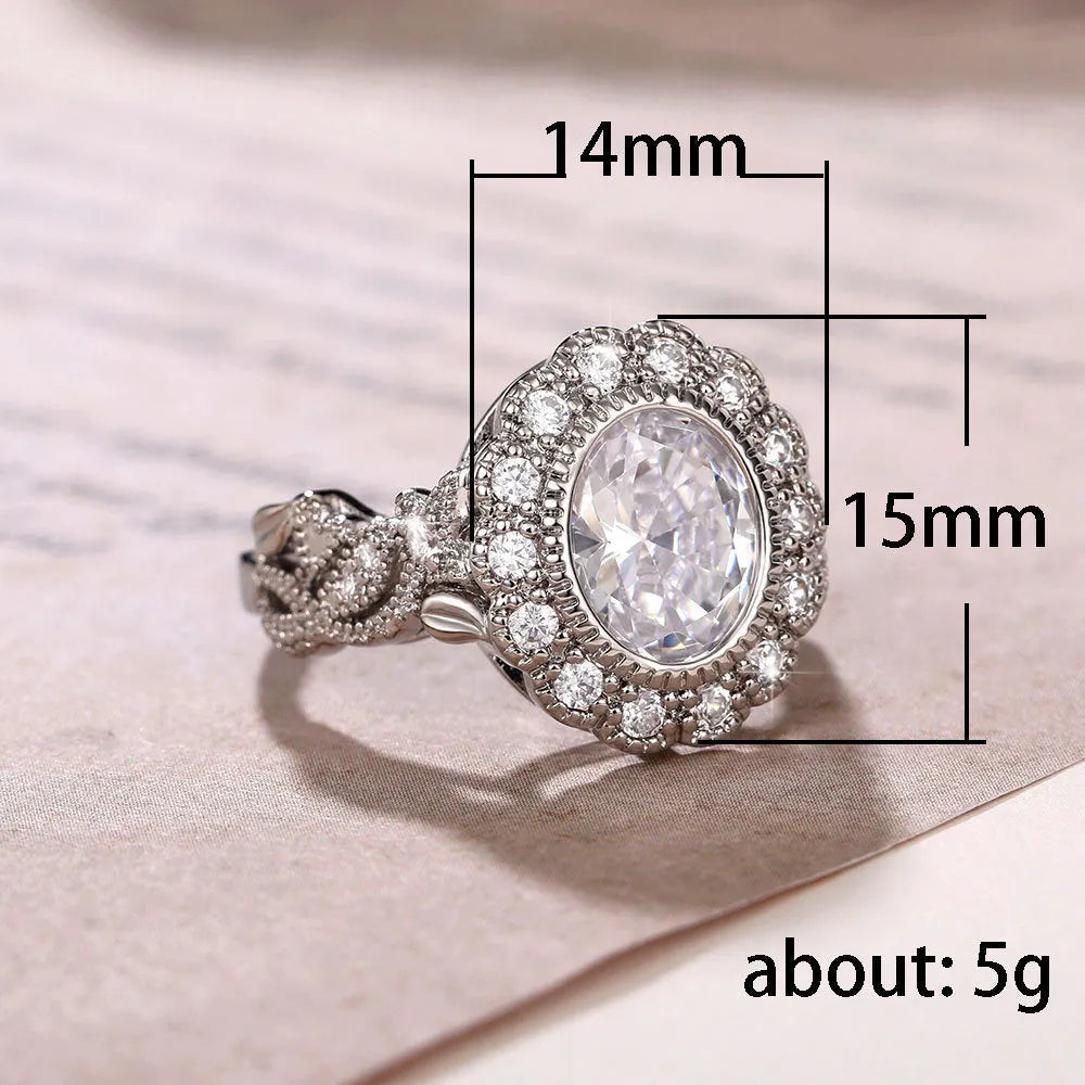 Geometric copper ring with round zircon stone in white gold colour plating.