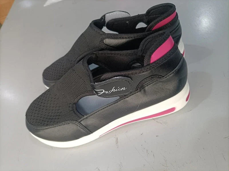 Breathable mesh sneakers with low-profile wedge heel and non-slip rubber outsole, available in red, black, blue, and pink colors