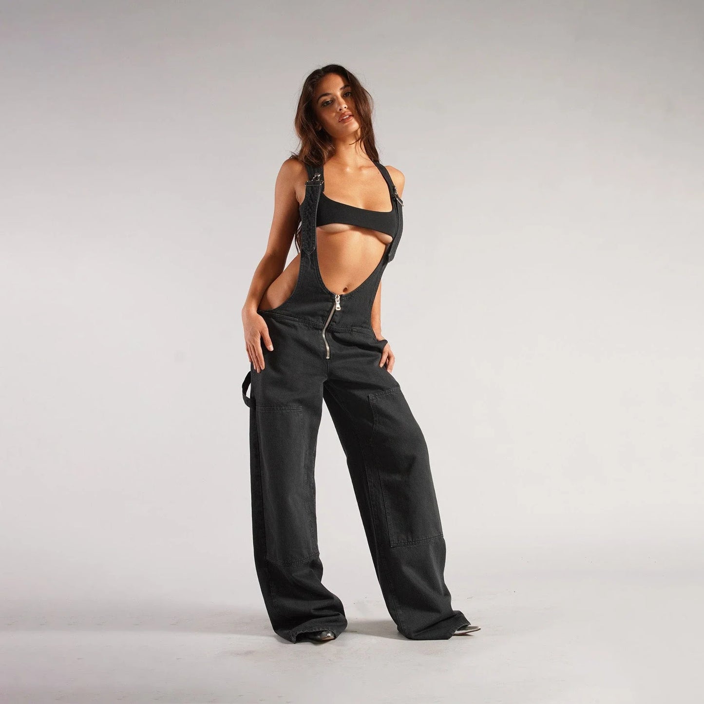 Fashionable Y2K-inspired denim overalls with pockets, suspenders, and a loose, comfortable fit