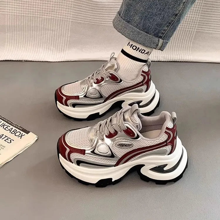 Women's silver and red mesh breathable platform sneakers with a round toe and lace-up front.