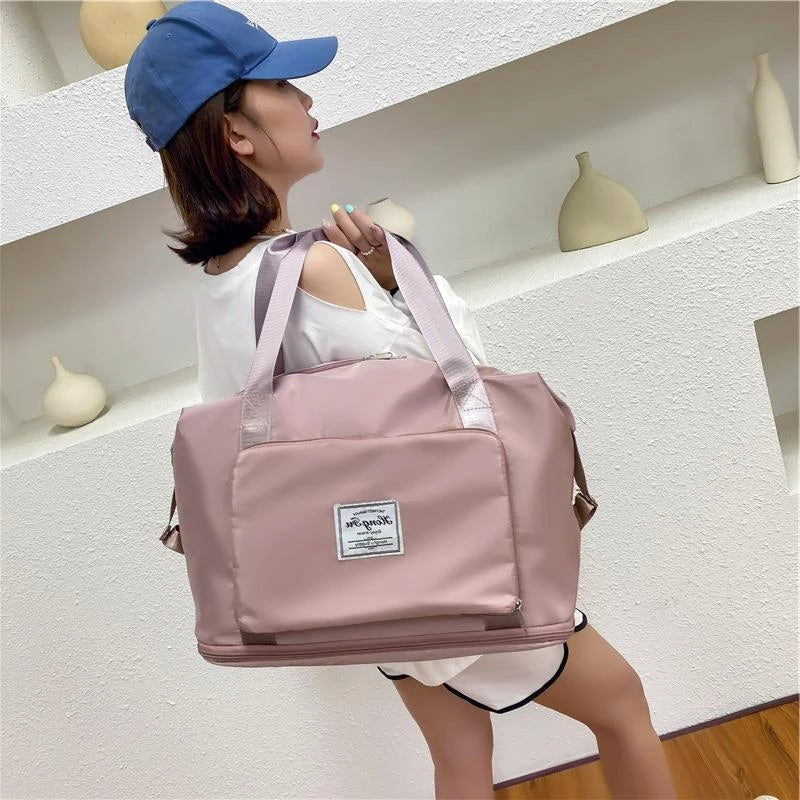 Versatile foldable travel bag with large 36-55L capacity, multiple interior pockets, and water-resistant Oxford cloth construction