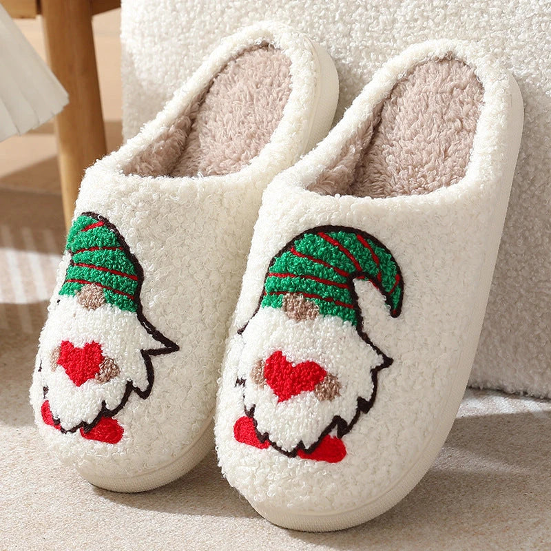 Cozy Santa Claus-themed plush slippers with soft, short-pile fabric and durable TPR soles for indoor wear and holiday cheer
