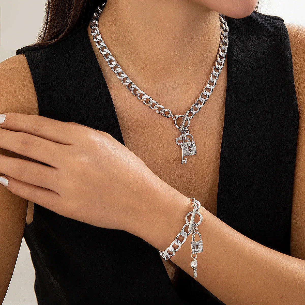 Stylish lock and key pendant necklace with a delicate chain, available in a variety of colors and materials