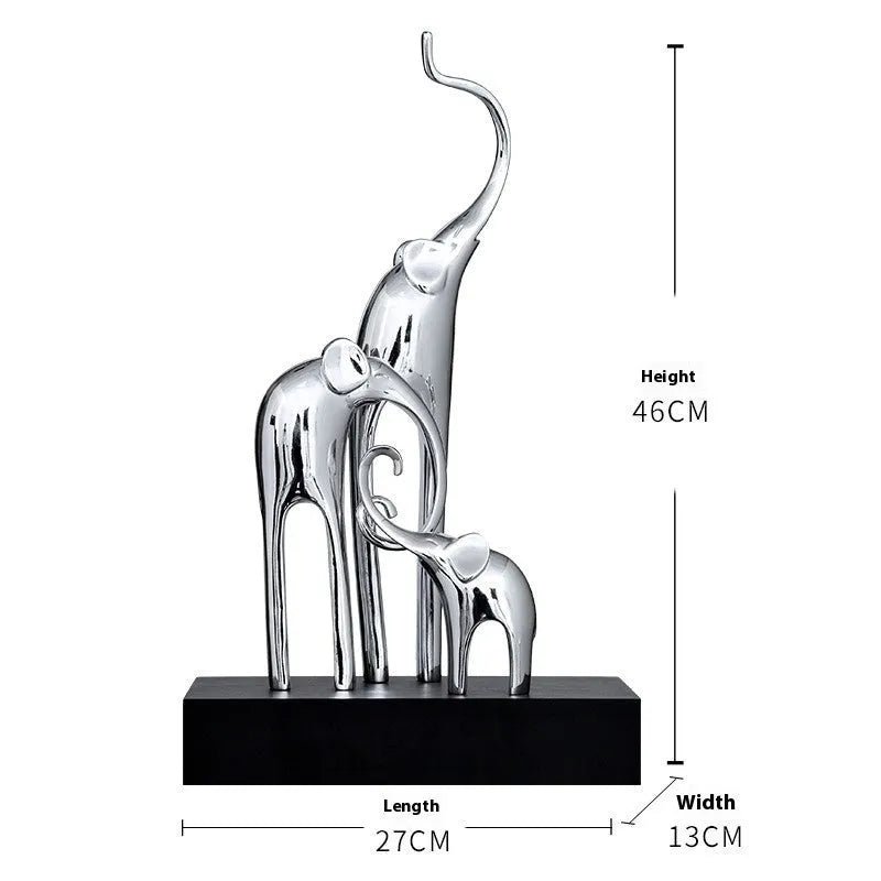 Fortune Bring Elephant resin decorative figurine in gold finish, 15cm tall on a wooden surface.