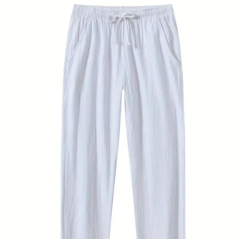 Men's cotton linen beach trousers in loose casual fit, shown in solid colour options