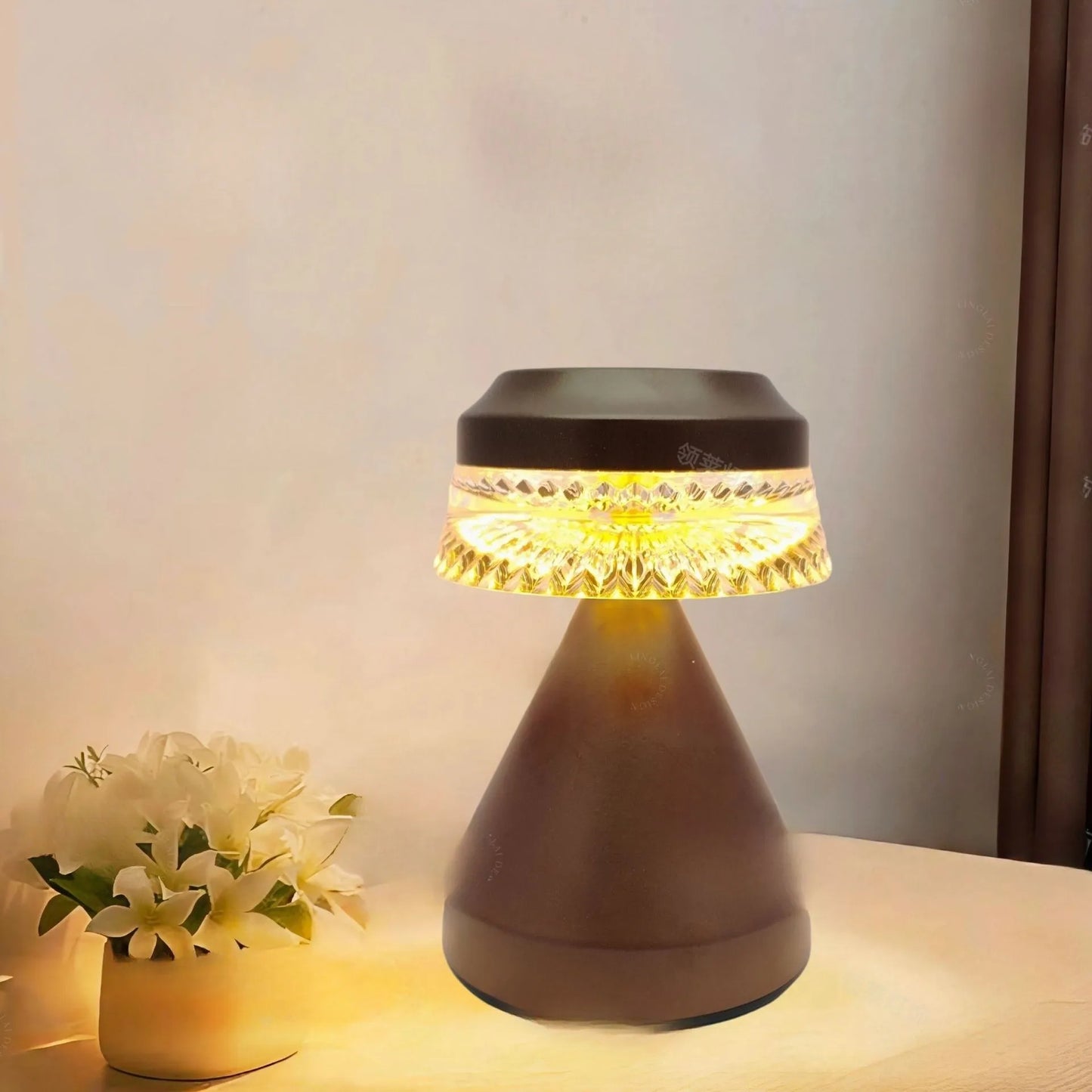 Small modern LED night lamp on a table with USB cable, shown in black, brown, and orange colour options.