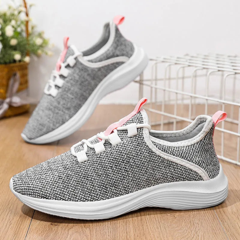 Women's black mesh casual sneaker with lace-up closure and EVA sole