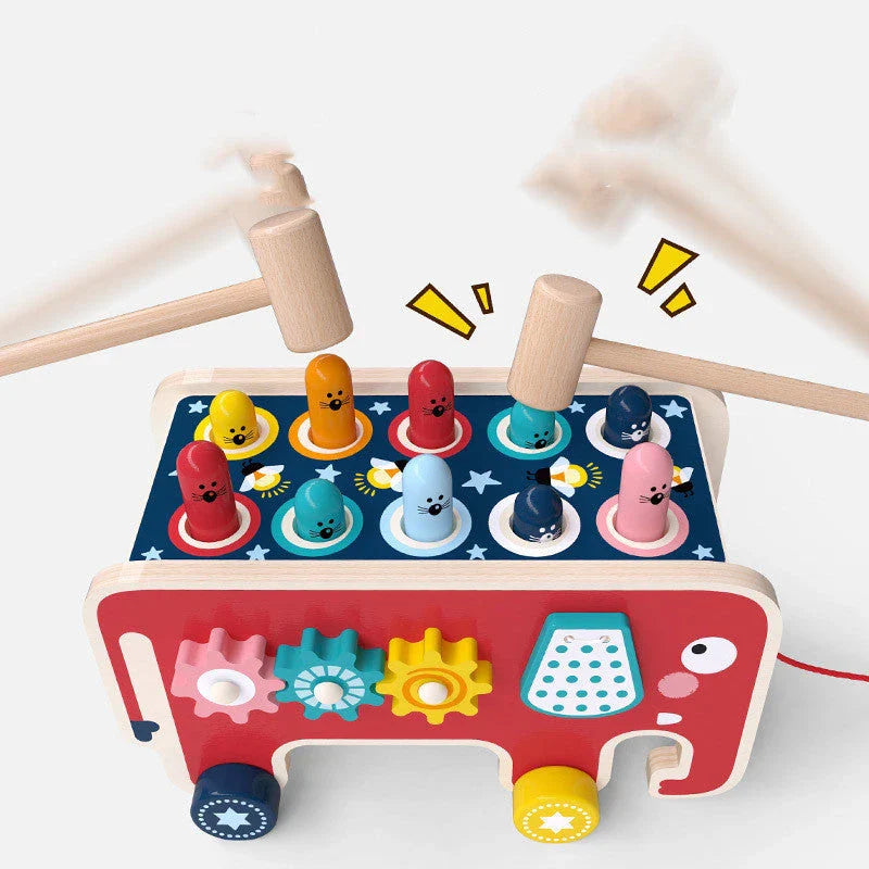 Wooden pounding bench toy with vibrant animal designs, promoting hand-eye coordination and creativity for toddlers and kids