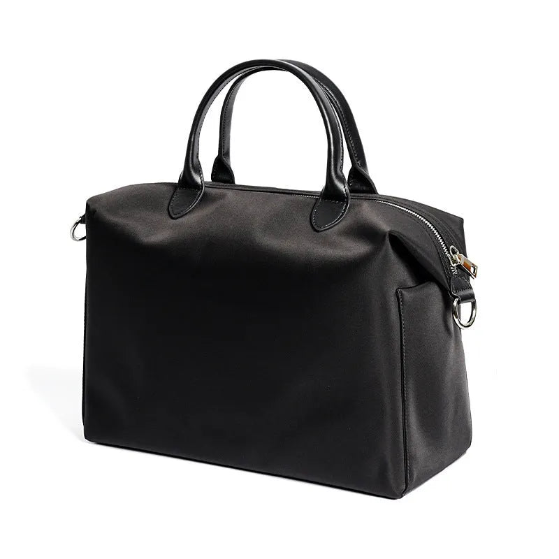 Nylon waterproof cloth shoulder bag with leather details in black or light khaki colour, 35x14x27cm dimensions