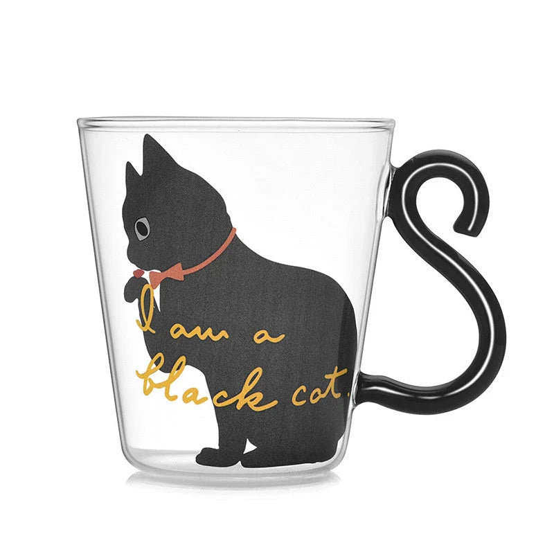Adorable cat-shaped glass mug in black and white colors, perfect for coffee, tea, or juice