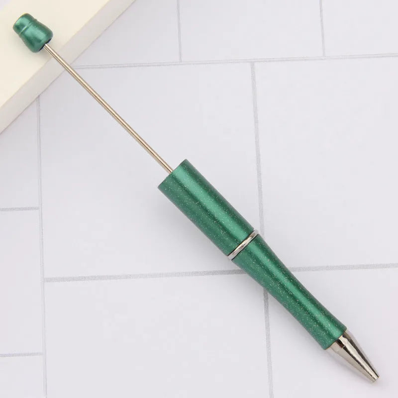 Rotating bead ballpoint pen in gradient colour with ABS plastic and steel wire construction