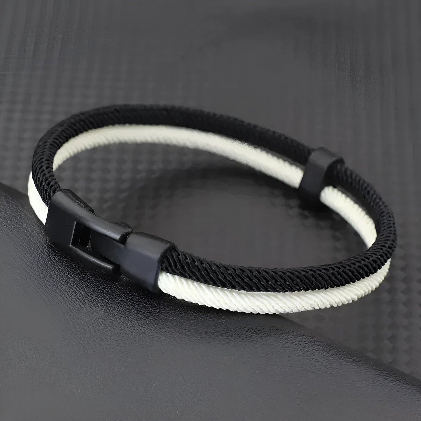 Black and white woven hand strap made from Milan rope alloy, shown at 19cm, 21cm, and 23cm lengths.