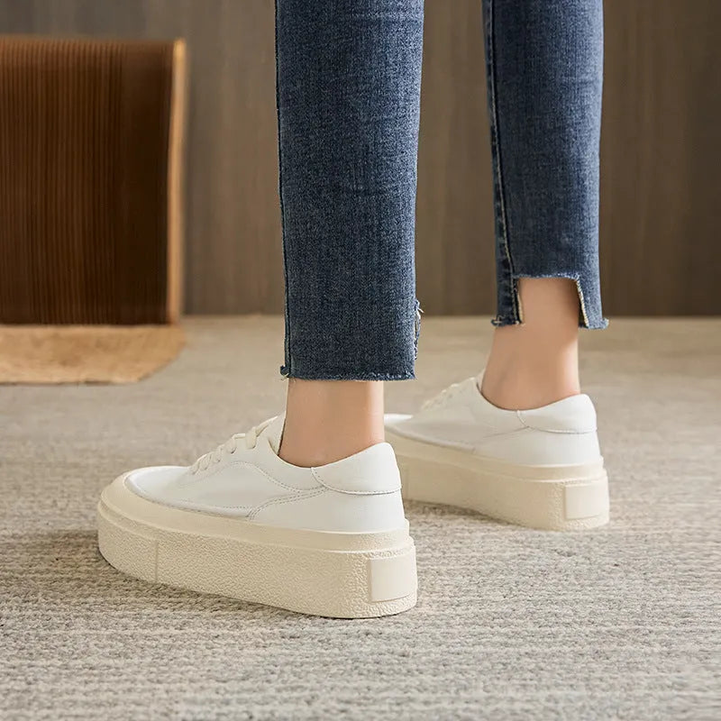 Women's black and white cowhide platform casual shoes with round toe and rubber sole