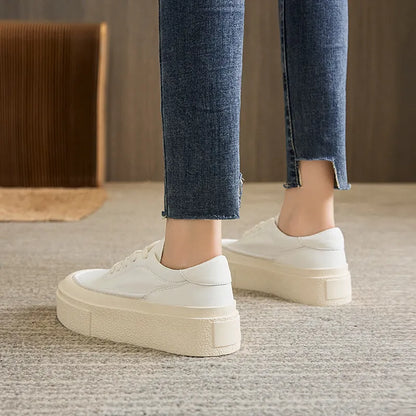 Women's black and white cowhide platform casual shoes with round toe and rubber sole