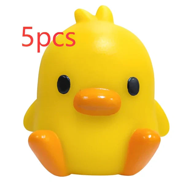 Small yellow duck-shaped night lamp measuring 6cm tall with warm LED light