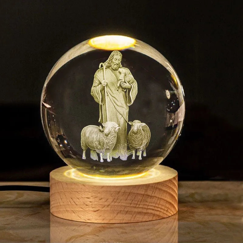 White crystal ball ornament with solid wood warm light base, showing purity engravings like Cross and Maria for desk decor