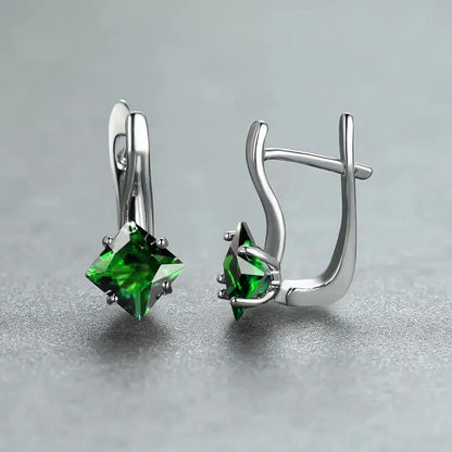 Diamond design earrings with inlaid zircon stones in copper, showing light luxury style for women in blue, green, and colour options.