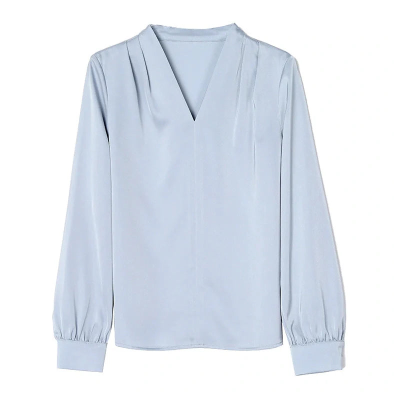 Women's blue long sleeve shirt with slim fit design and 3D stitching construction detail