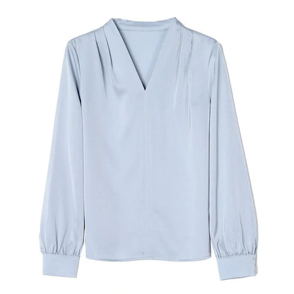 Women's blue long sleeve shirt with slim fit design and 3D stitching construction detail