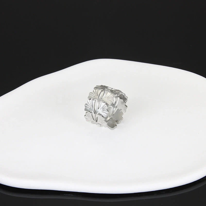 Adjustable stainless steel finger ring with unique charm designs in various colors