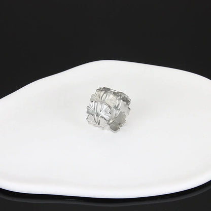 Adjustable stainless steel finger ring with unique charm designs in various colors