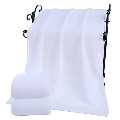 White hotel bath towel with thickened 100% cotton construction showing texture detail
