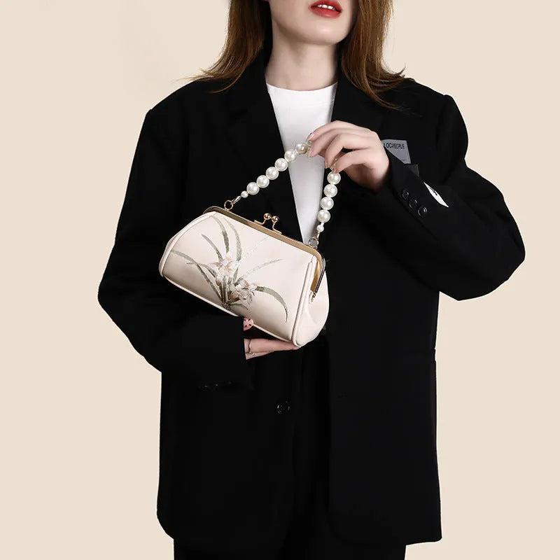 Beige soft PU shell-shaped women's shoulder bag with embroidered detail