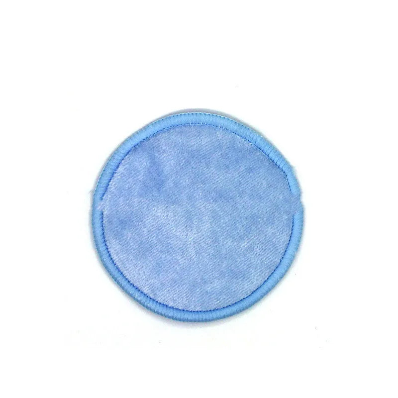 Set of water pink and light blue velvet makeup remover pads next to a cotton mesh storage bag.