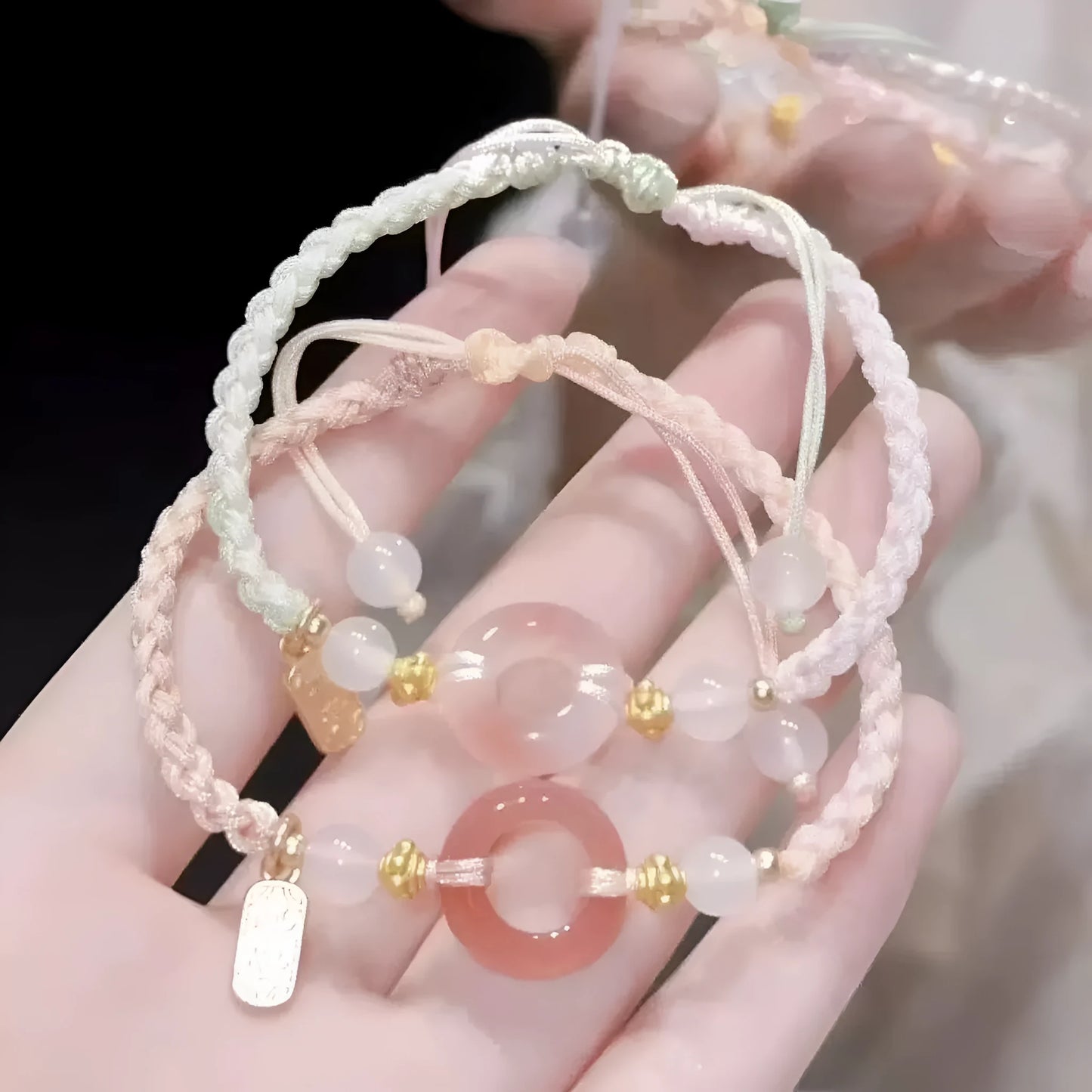 DIY woven watch band in peach blossom colours with national style pattern