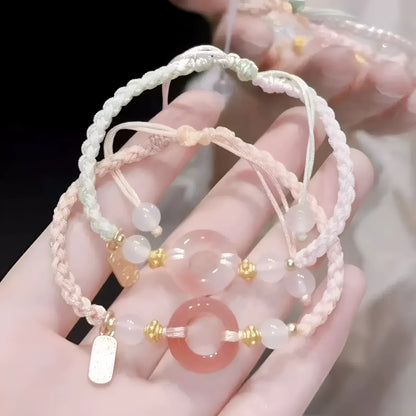 DIY woven watch band in peach blossom colours with national style pattern