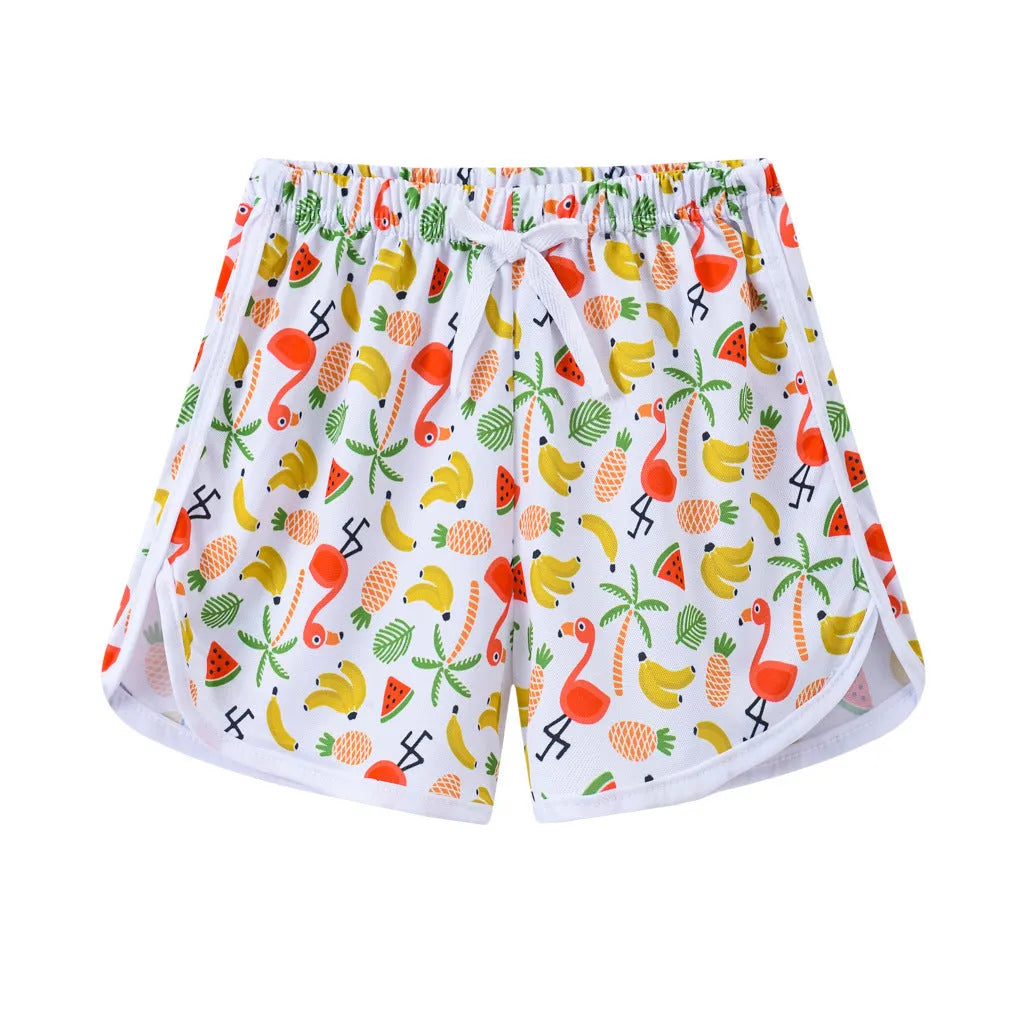 Children's polyester beach shorts in multiple colours and patterns, including leopard print and stripes, shown on size chart.