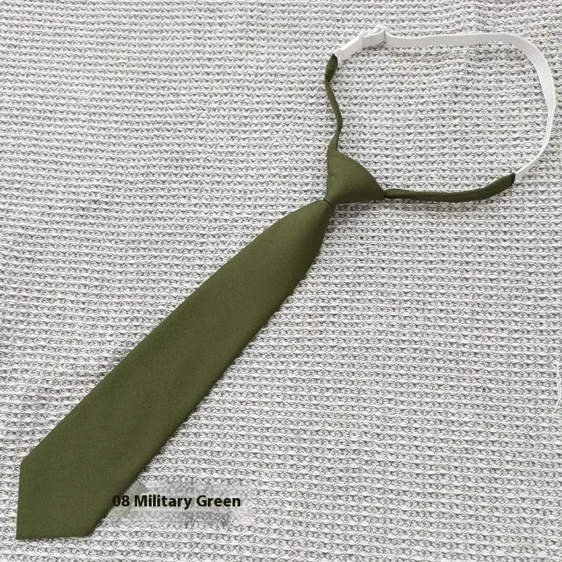 Men's navy blue cotton bow tie with arrow style shape on a white background.