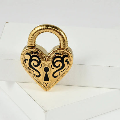 Women's heart-shaped fashion earrings in stainless steel with gold or steel colour electroplating