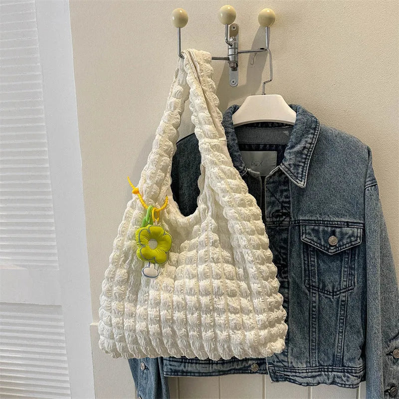 Women's pleated bubble crossbody bag in vertical square shape with pendant accessory