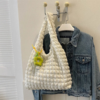 Women's pleated bubble crossbody bag in vertical square shape with pendant accessory