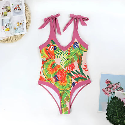 Pink floral print women's retro swimsuit with V-neck and attached thin skirt cover