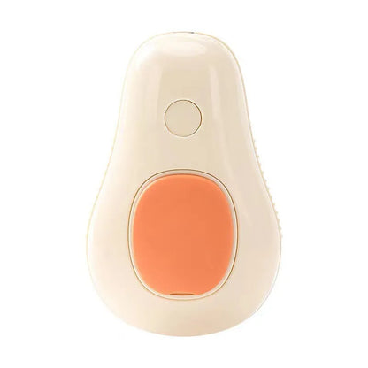 Green avocado-shaped pet grooming spray brush with comb for dogs and cats on a white background.