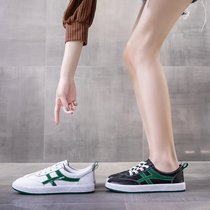 Casual sneakers in Korean style with elastic band wearing method, featuring first layer cowhide upper, rubber sole, breathable lining, and round toe design available in white or black colours across EU sizes 35 to 40