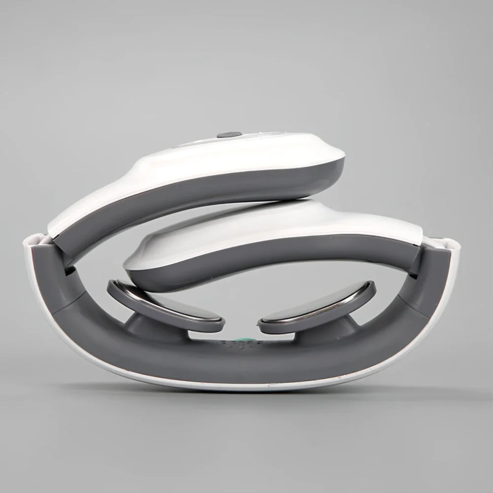 White folding electric pulse shoulder massager showing compact 19cm by 12.5cm by 6cm size with USB charging port
