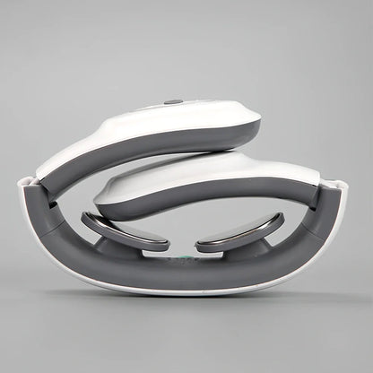 White folding electric pulse shoulder massager showing compact 19cm by 12.5cm by 6cm size with USB charging port